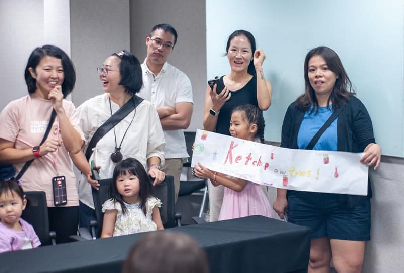 Families gathered to hear children present their storytelling project
